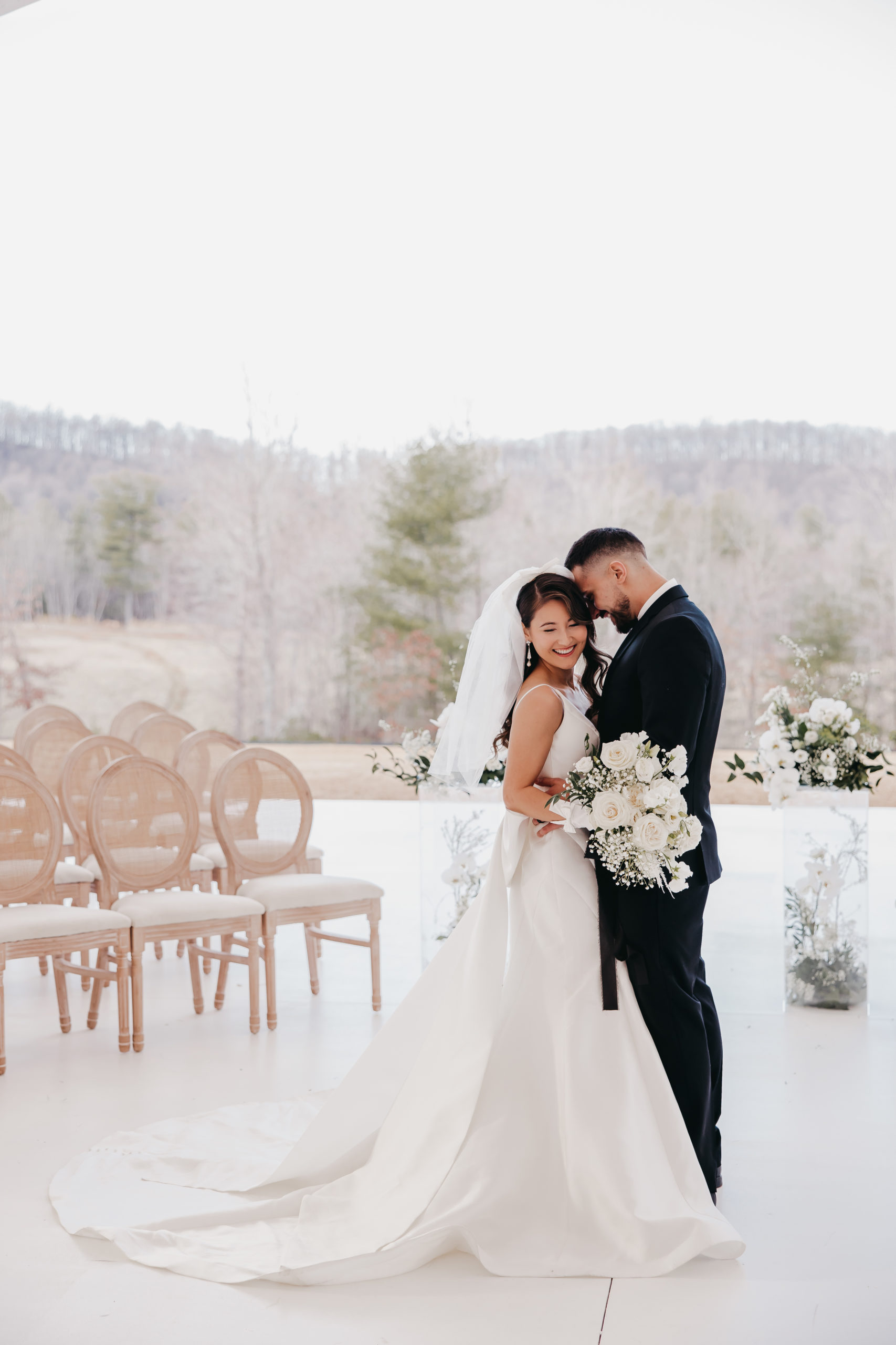 Couple sharing an embrace at their Virginia wedding venue taken by Rachel Yearick Photography