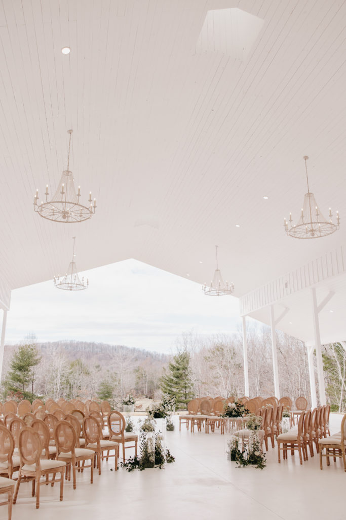 Top 6 Virginia Wedding Venues + Pricing. Rose room with chandeliers overhead.