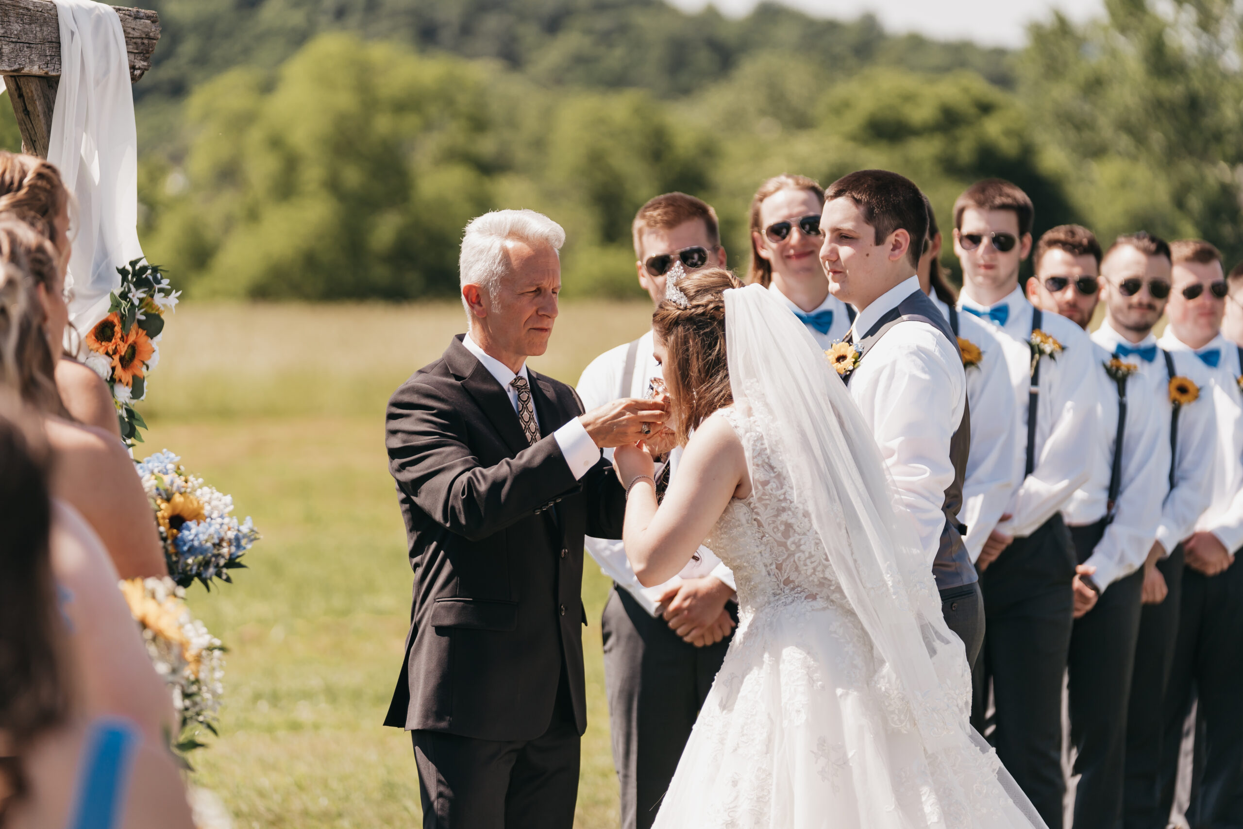 Bride taking communion during their wedding ceremony, captured by Loudoun wedding photographer Rachel Yearick