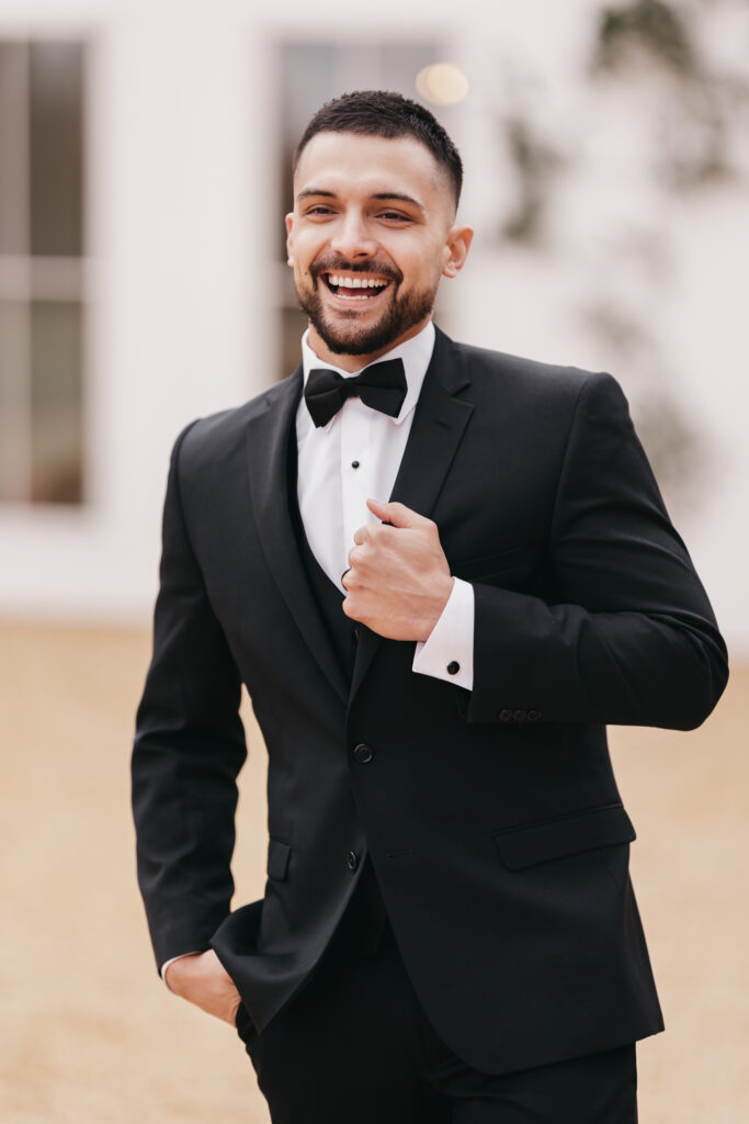 groom smiling on his wedding day