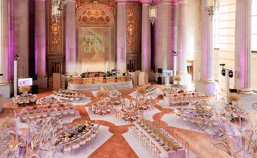 Luxury black-tie wedding at Andrew Mellon Auditorium with grand columns and gilded ballroom decor