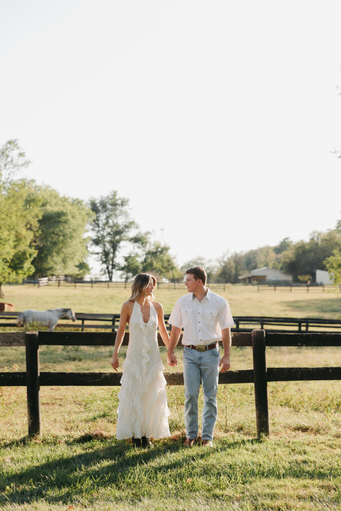 Romantic engagement photo capturing elegant western charm and countryside textures in Bluemont, Virginia