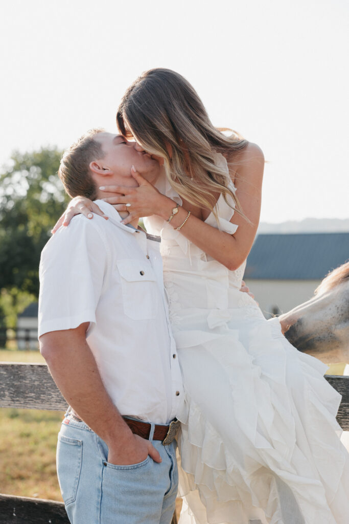 Romantic engagement photo capturing elegant western charm and countryside textures in Bluemont, Virginia.