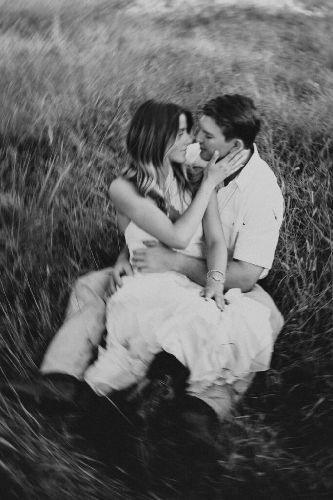 Romantic engagement photo capturing elegant western charm and countryside textures in Bluemont, Virginia.