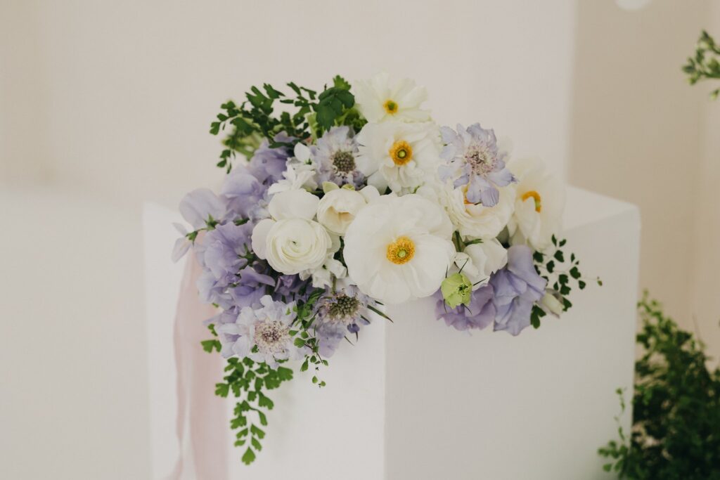 purple wedding bouquet photographed by Rachel Yearick