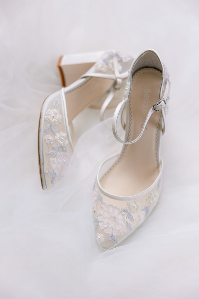 bride's shoes at Raspberry Plain Manor during a winter wedding in Leesburg Virginia
